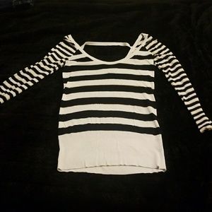 Black and white long sleeve top with gold trim